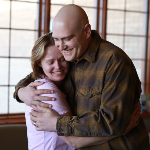 Cody Wood hugs his chemotherapy nurse after receiving treatment